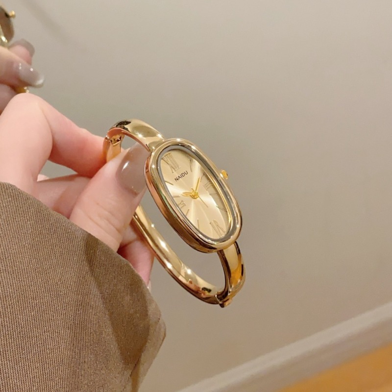 ハイエンドの女性用ローマスケールクォーツ時計シンプルなゴール - Quiet Luxury Watch のレビューと価格