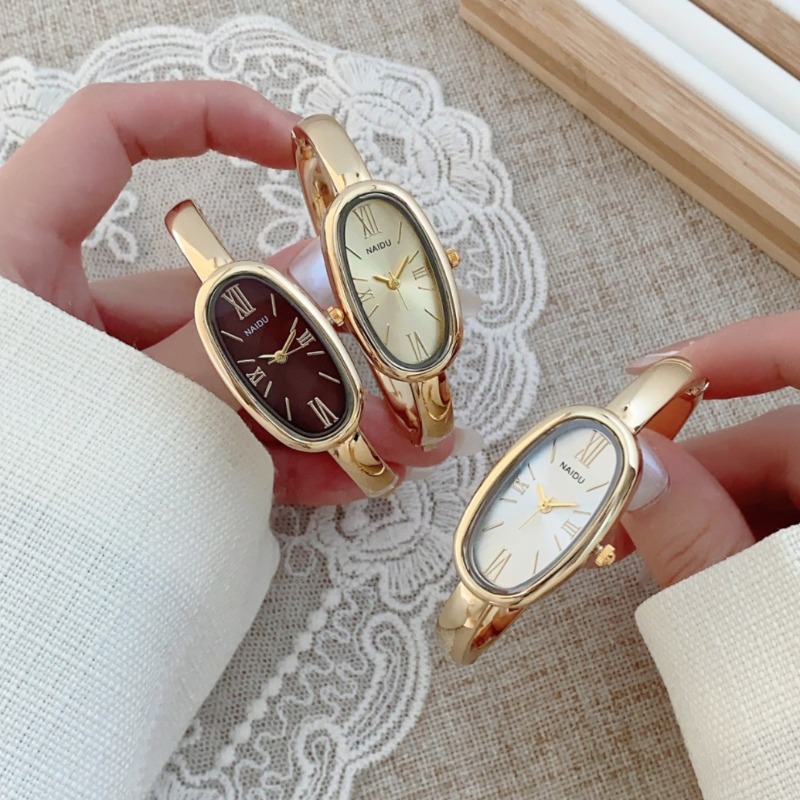 ハイエンドの女性用ローマスケールクォーツ時計シンプルなゴール - Quiet Luxury Watch のレビューと価格